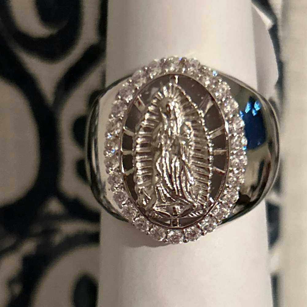 Intricate Silver Ring with Religious Design and Sparkling Accents